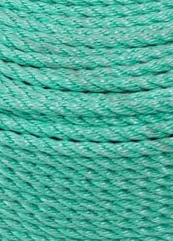 Close-up of teal yarn with a black thread