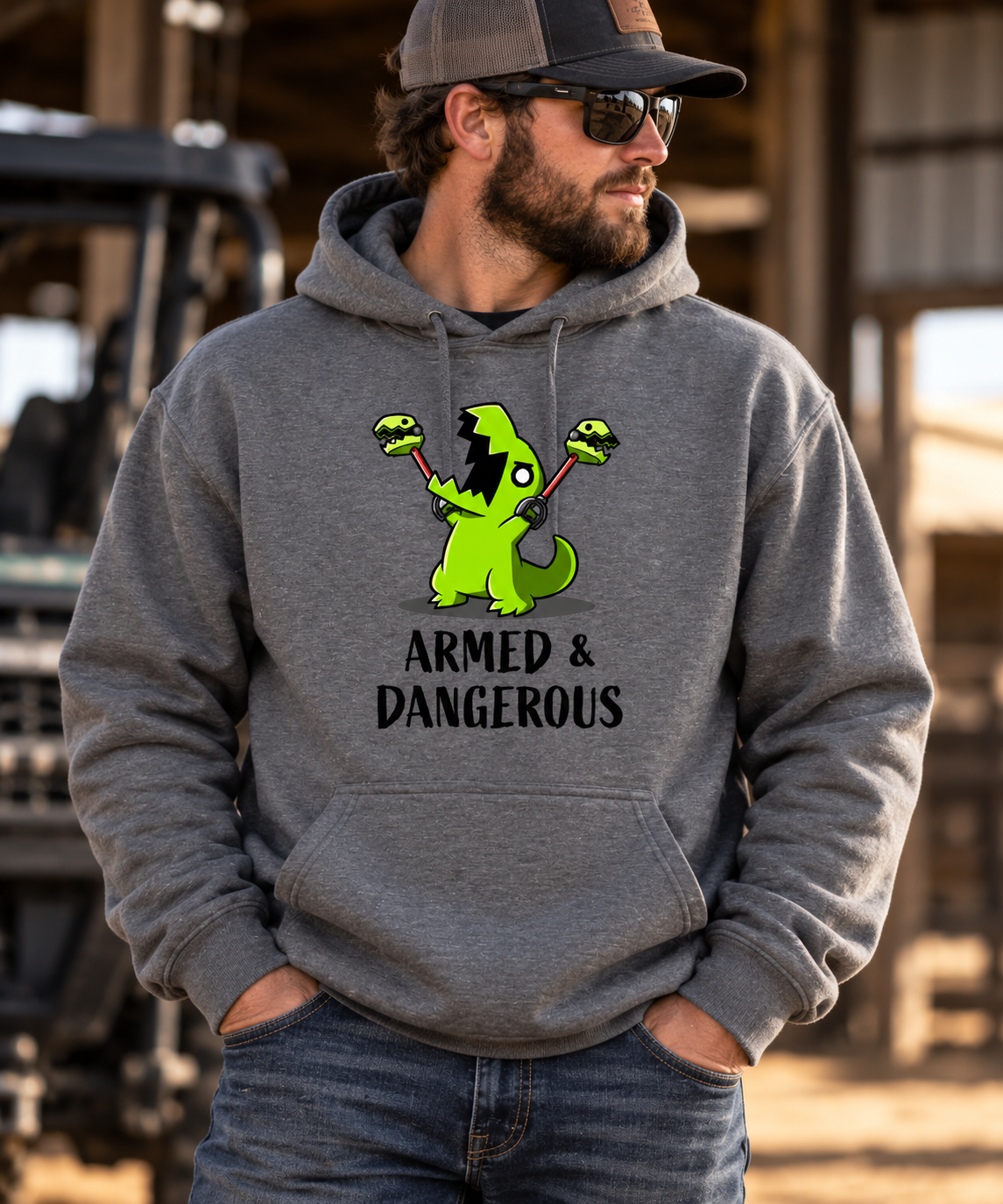 🦖💚 Armed & Dangerous – Unisex Hoodie